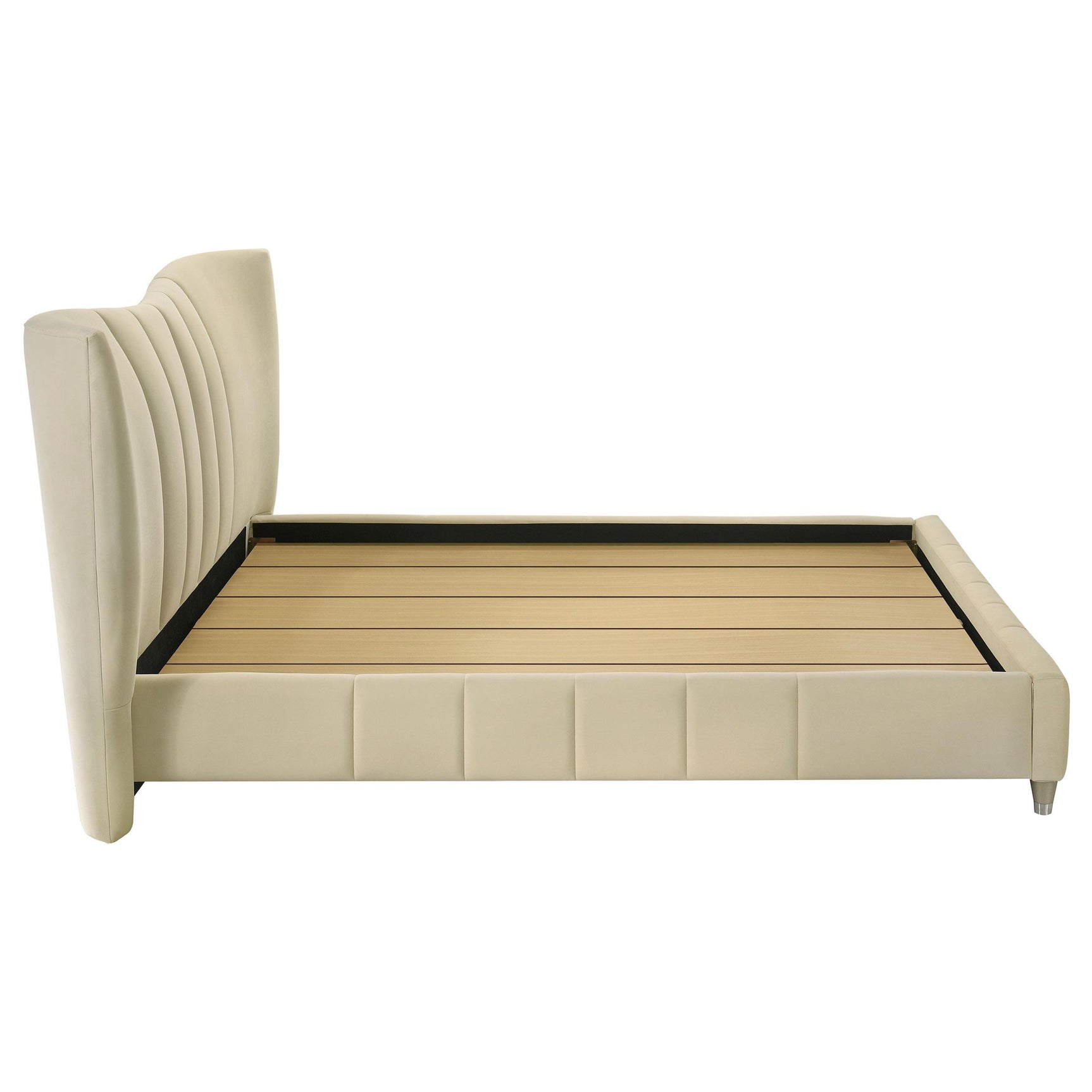 Evelyn bed corner showing gold leg and upholstery