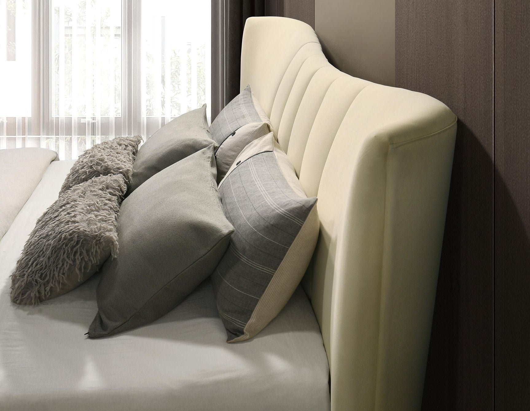 Headboard angle highlighting contour and fabric