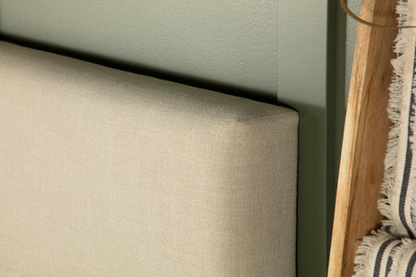 Izzy Upholstered Headboard full view with bedding