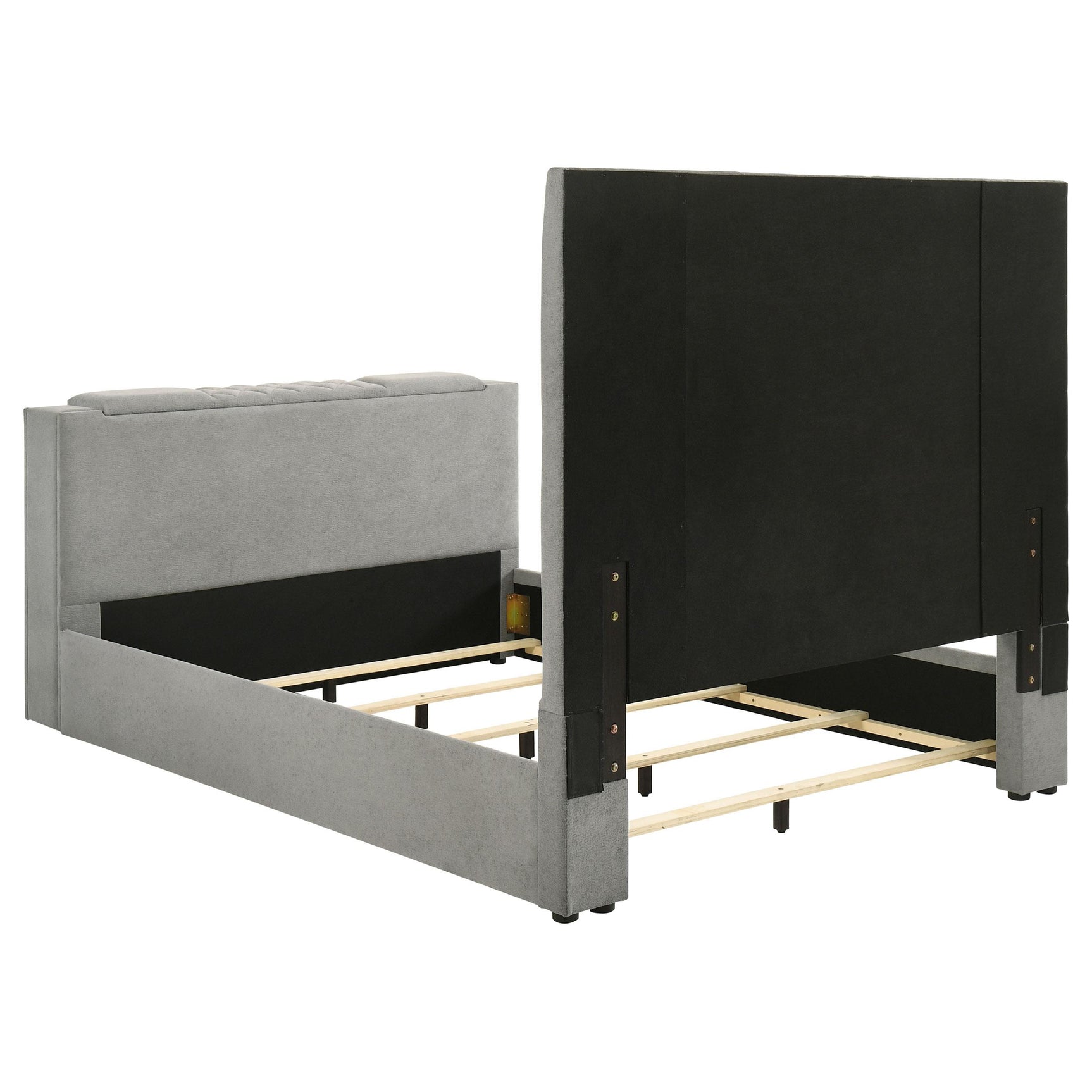 Support legs with plastic glides under Tara queen panel bed