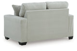 Side view showing sofa and loveseat backs