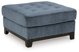 Maxon Place Navy Chenille Ottoman side view showing tufted top