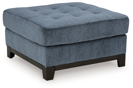 Maxon Place Navy Chenille Ottoman side view showing tufted top