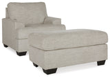Side view of Vayda Pebble Chair showing angular arm