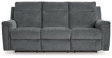 Power reclining sofa with control button visible