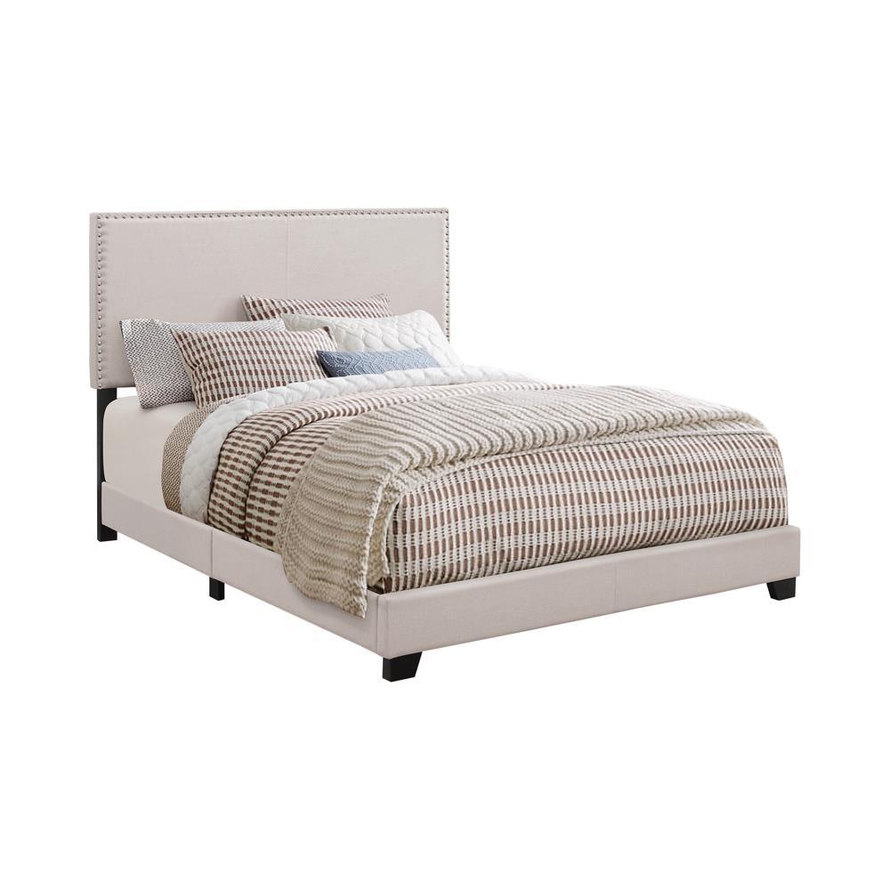 Boyd Queen Upholstered Bed Ivory Nailhead Trim side angle
