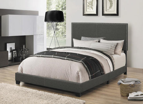 Boyd full size upholstered bed in charcoal with nailhead trim, front view