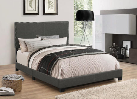 Boyd Twin Upholstered Bed with Charcoal Nailhead Trim angled view