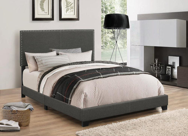 Boyd Twin Upholstered Bed with Charcoal Nailhead Trim angled view