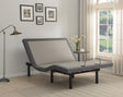 Negan Twin XL Adjustable Bed Base front view in grey and black upholstery