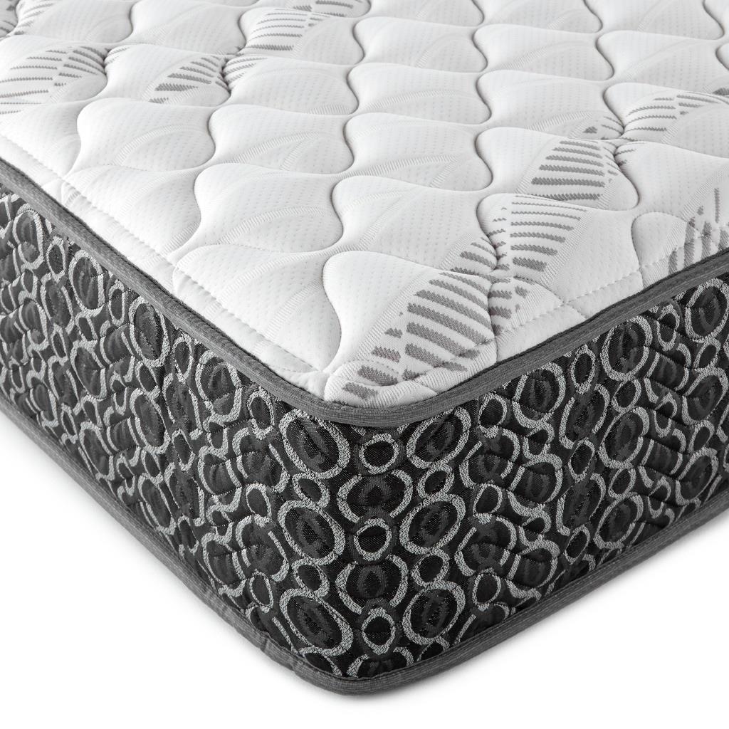 Side view of Hayes Queen Firm Tight Top Hybrid Mattress showing quilted firm foam layer
