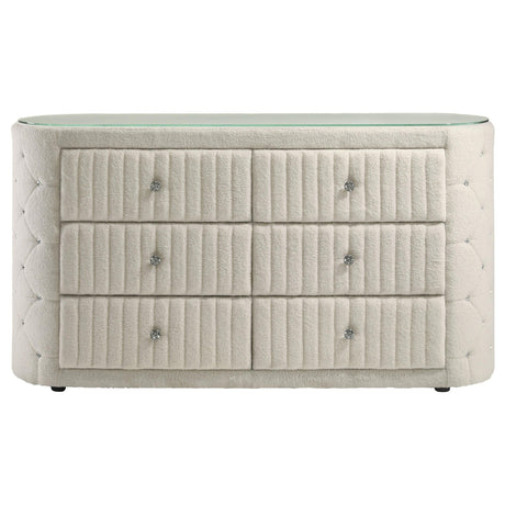 Drawer detail with crystal-inspired hardware and vertical channeling