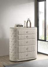 Side view of Sonya ivory upholstered chest featuring diamond tufting