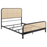 Close-up of black powder-coated metal frame and rattan textured headboard