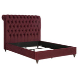 Close-up of wine red fabric upholstery on headboard