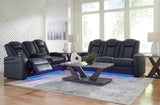 Console docking station between sofa seats