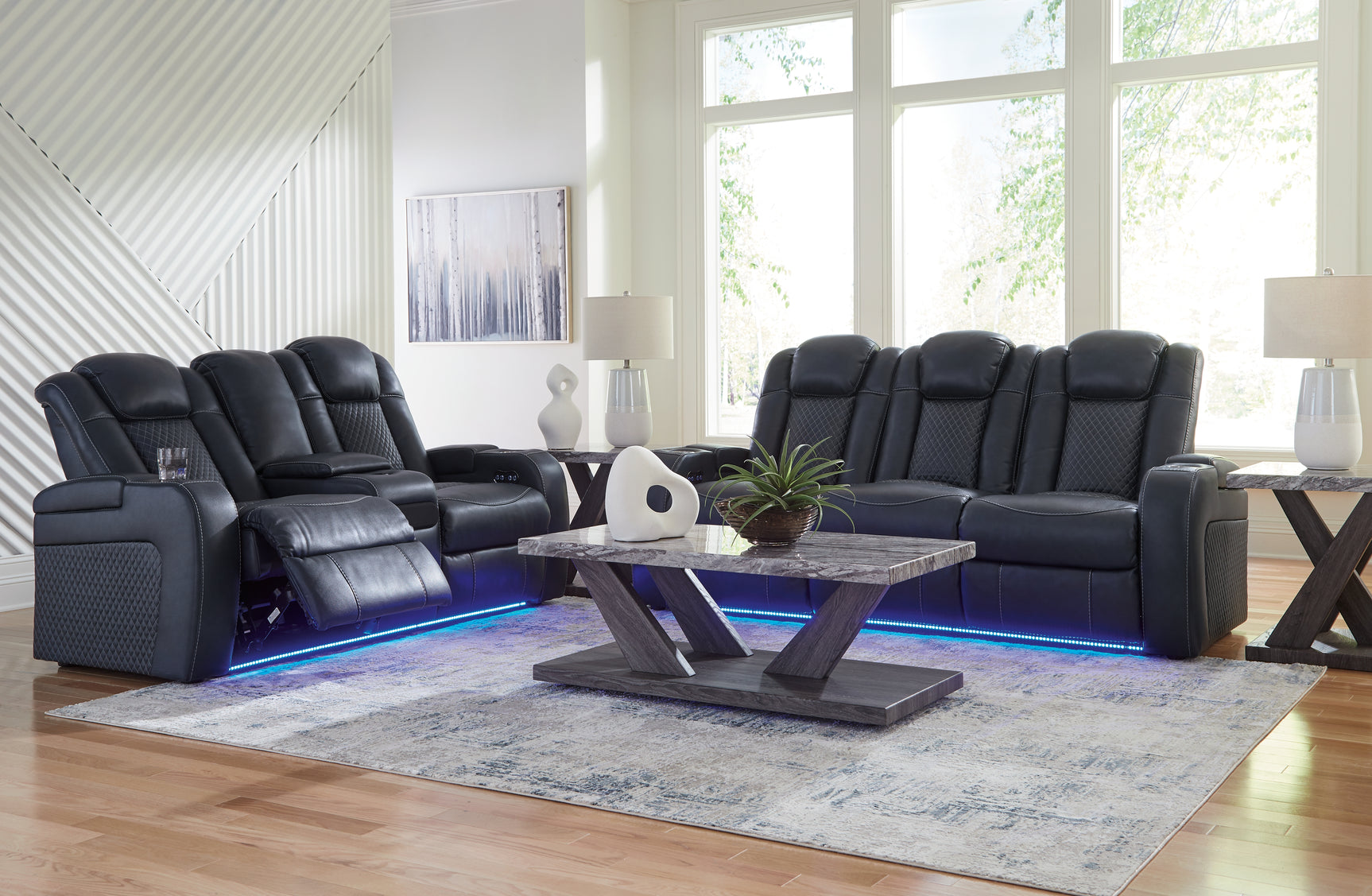 Console docking station between sofa seats