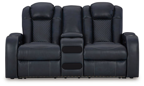 Power reclining sofa showing diamond stitching and LED lighting
