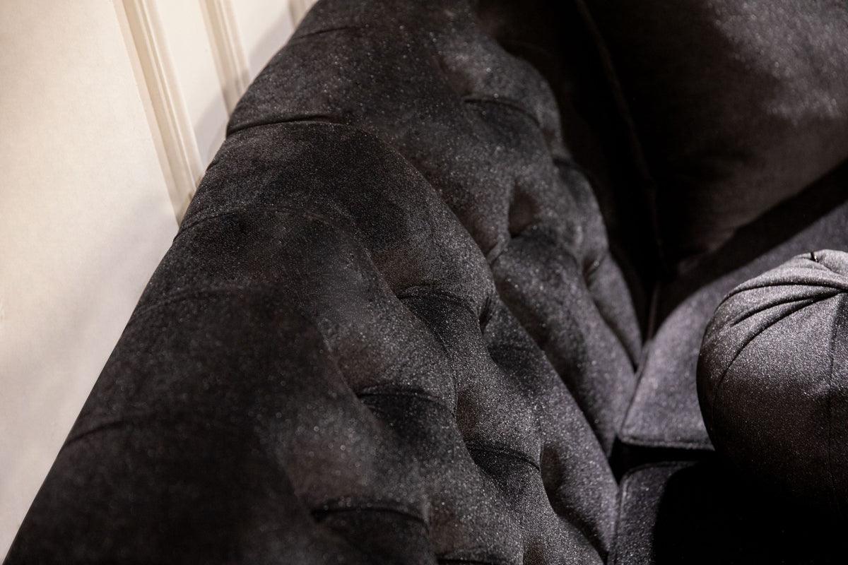 Close-up of sectional sofa armrest