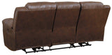 Stoneland Chocolate Faux Leather Power Reclining Sofa power switch close-up