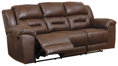 Side angle of Stoneland Chocolate Faux Leather Reclining Sofa