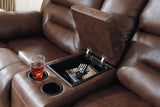 Stoneland Reclining Loveseat center console with storage and cup holders