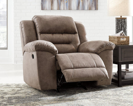 Reclining angle showing features of Stoneland Chocolate Faux Leather Recliner