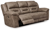 Side angle of Fossil reclining loveseat showing armrest