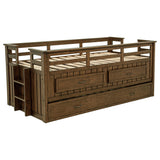 Two storage drawers open under the bed