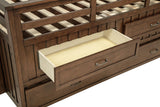 Drawer storage filled with bedding