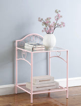 Tufted pink upholstered bench in bedroom setting