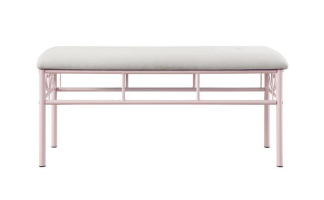 Close-up of tufted powder pink fabric upholstery on bench