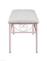 Detail of antique bronze nailhead trim on powder pink bench