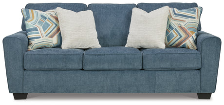 Head-on view of sofa in blue upholstery