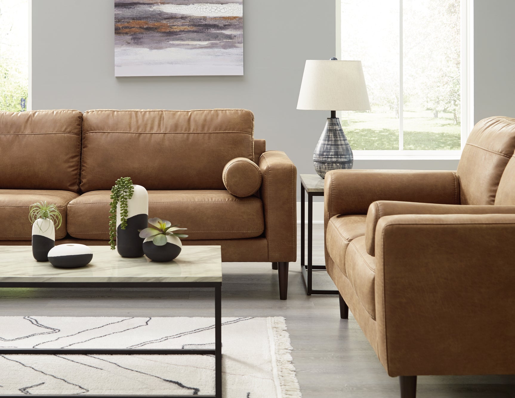 Mood setting with Telora Caramel Sofa and Loveseat