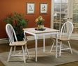 Front view of G4191 dining table with white tile inlay and 2 spindle back chairs