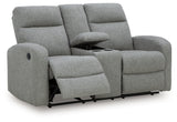 Console opened showing cup holders and storage