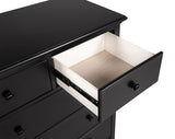 Sumerlin black chest with decorative items on top