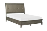side perspective of Cotterill gray tufted panel bed