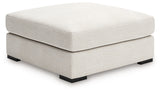 Donelson Creek Ottoman side profile showcasing upholstery and leg detail