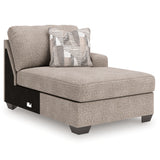 Side perspective of Newellen 3-piece sectional with double chaise