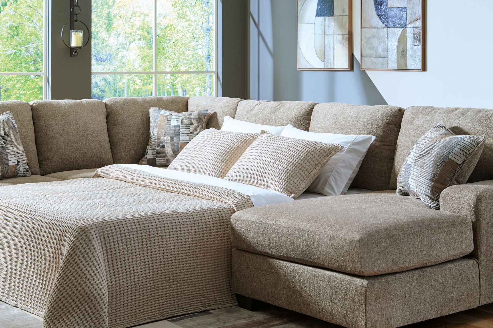 Side view of Newellen Hemp Chenille 3-Piece Sleeper Sectional with Chaise