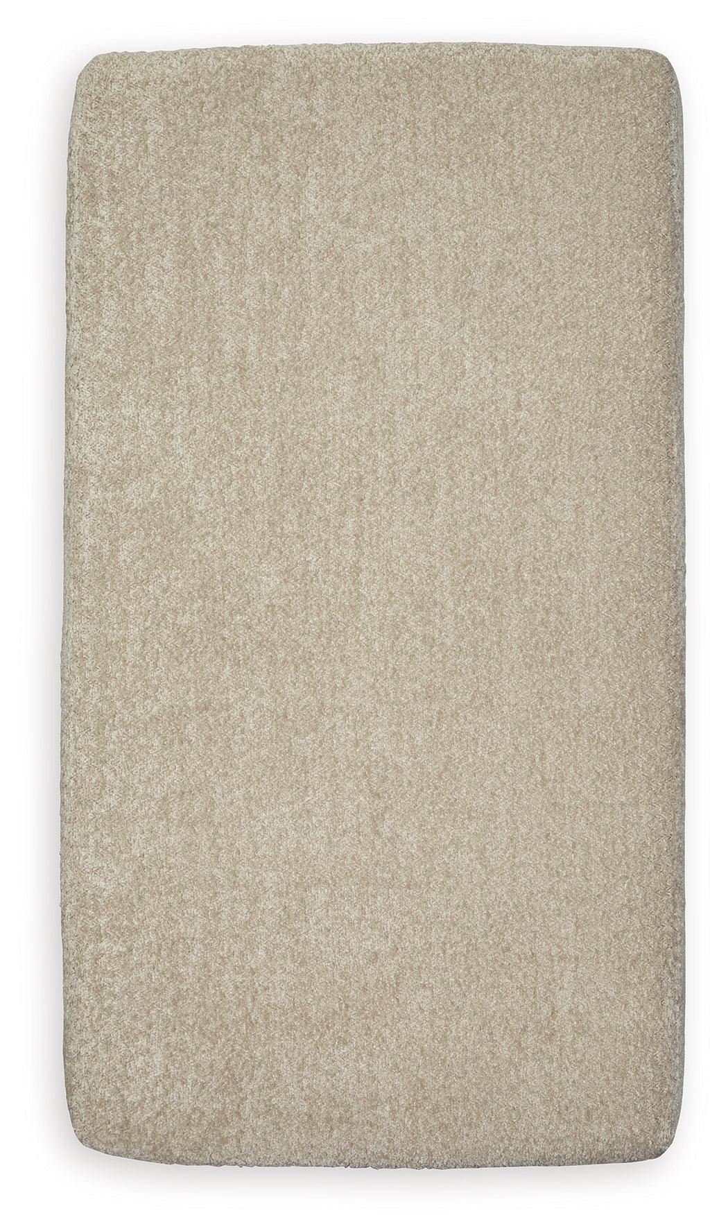 Top view of Parklynn Ottoman showing upholstery texture