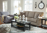 Renley Ash Swivel Glider Accent Chair styled in room