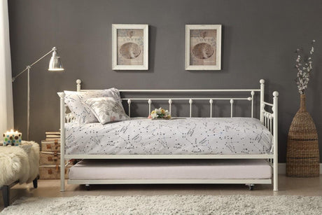 Lorena White Metal Daybed with trundle, decorative finials visible