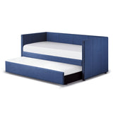 Pull-out trundle on casters under daybed