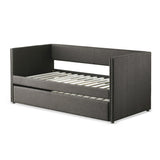 Side view of Therese gray upholstered daybed with nailhead trim