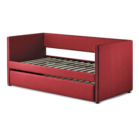 Side view of red upholstered daybed showing nailhead trim