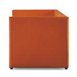 Side view of orange upholstered daybed with trundle