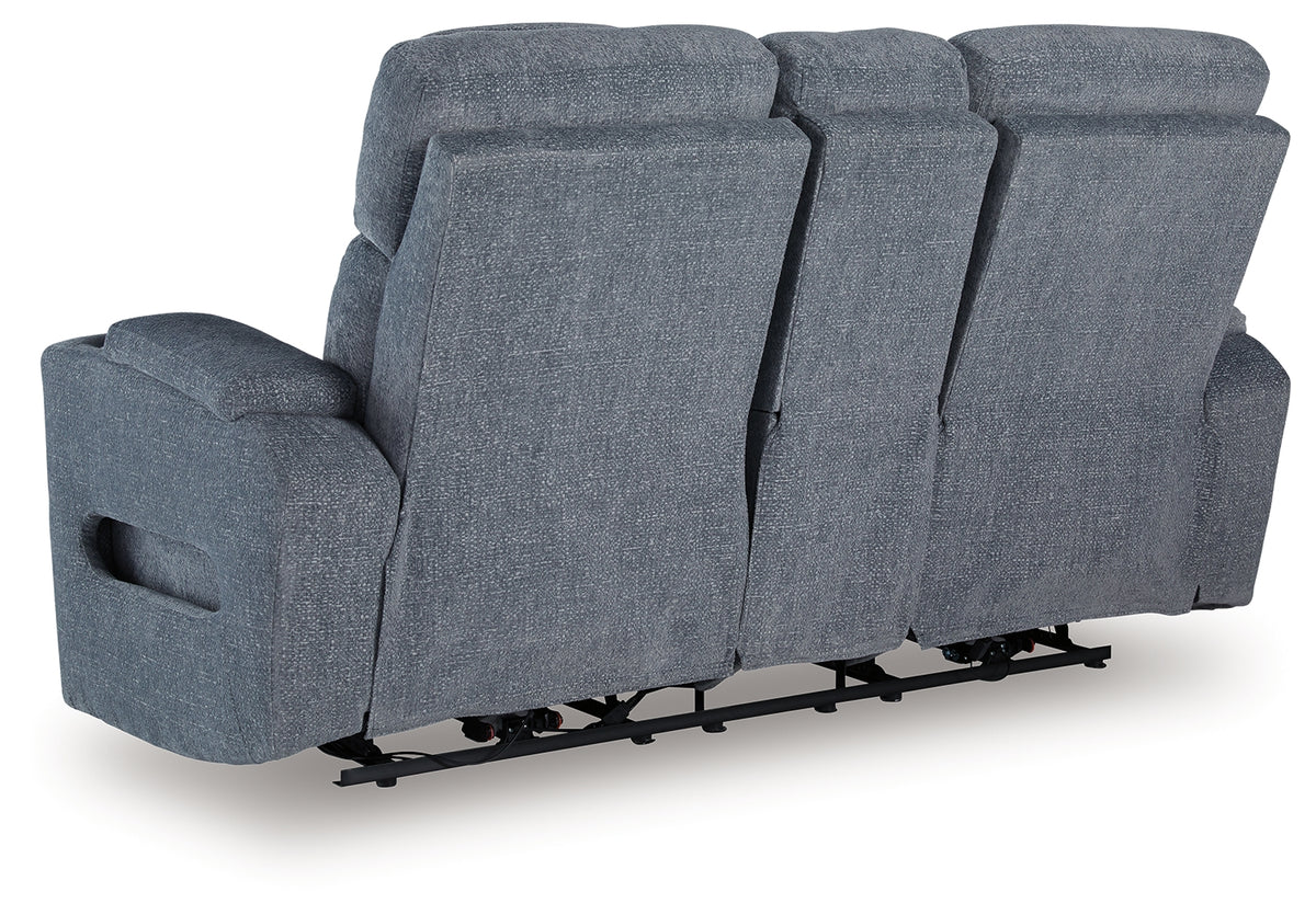 Ambient blue LED lighting on loveseat base and storage areas